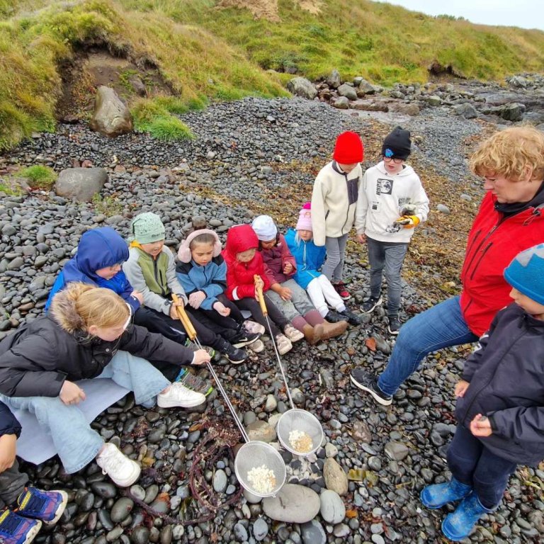 Poppað í fjörunni